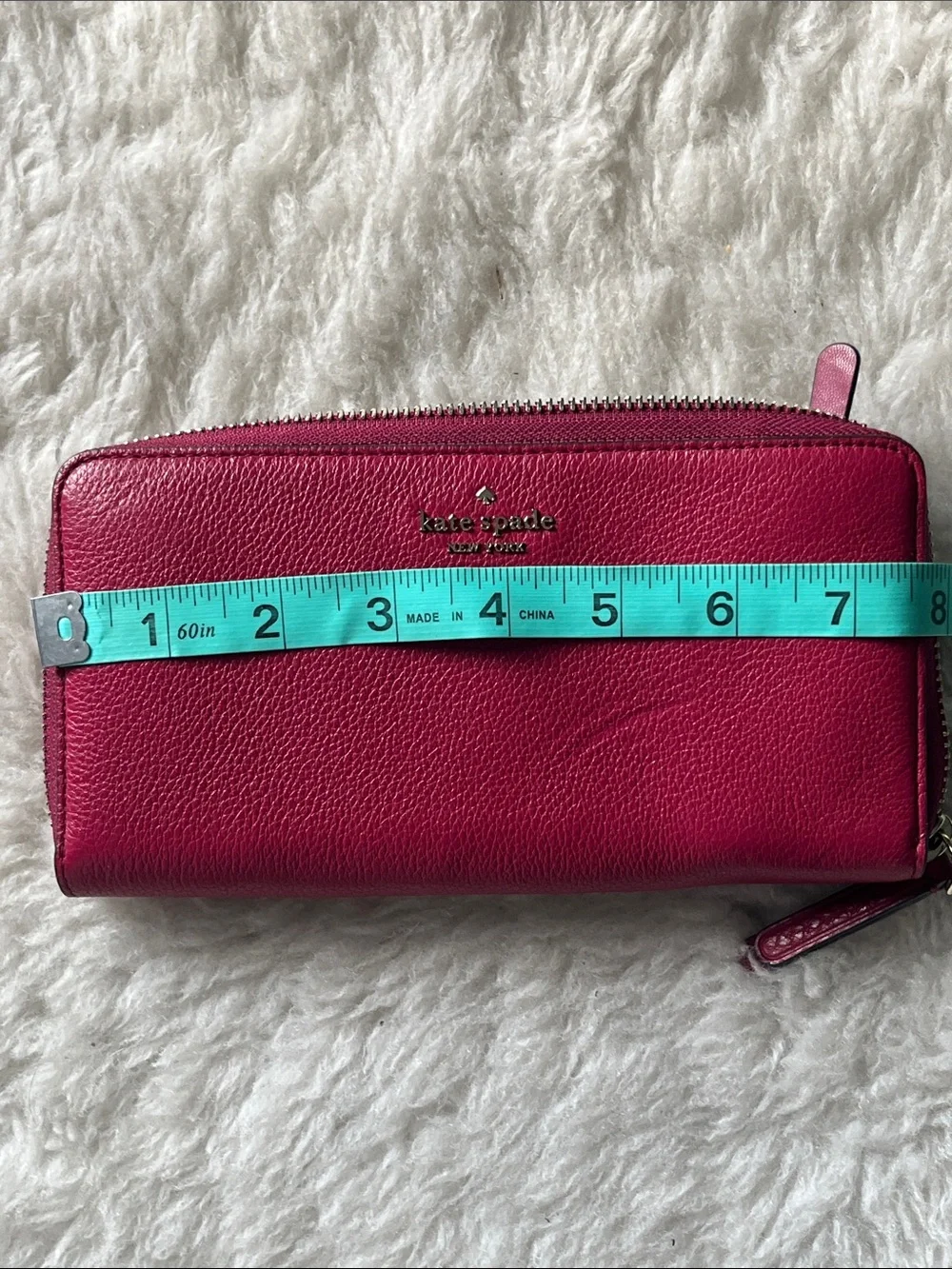 kate spade raspberry pebbled leather zip-around wallet